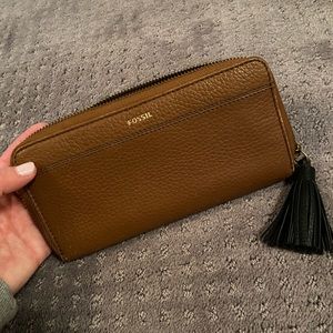 Like new Fossil zip around wallet.